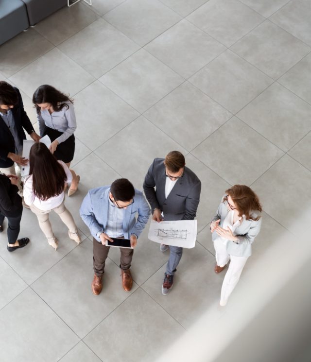 Group of business people collaborating on project  in business office